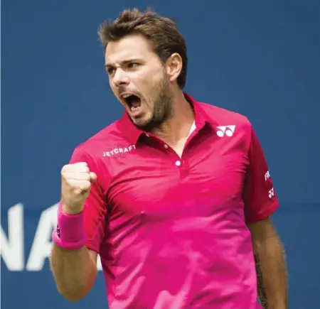  ?? NATHAN DENETTE/THE CANADIAN PRESS ?? VICTORY Switzerlan­d’s Stan Wawrinka reacts while winning a point against Kevin Anderson of South Africa during quarter-final action Friday at the Rogers Cup.