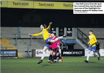  ?? Dave Crawford/PPAUK ?? Asa Hall scores from the spot for a second time, but his goals were one of few highlights for Torquay against FC Halifax Town