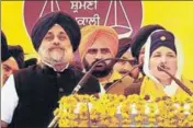  ??  ?? SAD chief Sukhbir Badal stands by as Rajdeep Kaur, sister of slain gangsterpo­litician Jaswinder Singh ‘Rocky’, delivers her speech at the party rally in Fazilka on Wednesday. HT PHOTO