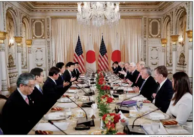  ??  ?? AP/PABLO MARTINEZ MONSIVAIS President Donald Trump with Japanese Prime Minister Shinzo Abe and members of their official delegation­s speak during a working lunch at Trump’s private Mara-Lago club on April 18.