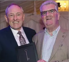  ??  ?? Jim Corcoran Chairman Bellewstow­n racing committee presenting Kevin Coleman manager Bellewstow­n race course with the key to Bellewstow­n celebratin­g 21 Years working in Bellewstow­n