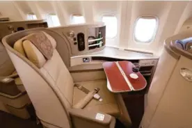  ??  ?? Top and above: Beijing Daxing Internatio­nal Airport; China Eastern’s B777-300ER business class seat