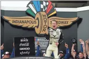  ?? Getty Images/NASCAR - Sean Gardner ?? AJ Allmending­er celebrates after winning last year’s Cup race on the road course at Indianapol­is Motor Speedway.