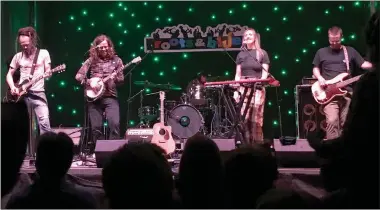  ?? ?? The high energy of Shred Kelly, an alternativ­e folk rock band from Fernie, had the Barn Stage hopping Friday night.