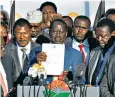  ??  ?? Opposition leader Raila Odinga announces that he is withdrawin­g from the election