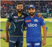  ?? Sportzpics for IPL ?? Hardik Pandya, left, who was captain of Gujarat Titans, is now back at Mumbai Indians as skipper in place of Rohit Sharma, right