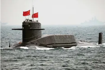  ?? Foto: Guang Niu, dpa ?? Wie entwickelt sich das Verhältnis zwischen China – hier ein Atom-U-Boot – und den USA? Die Sorge wächst.