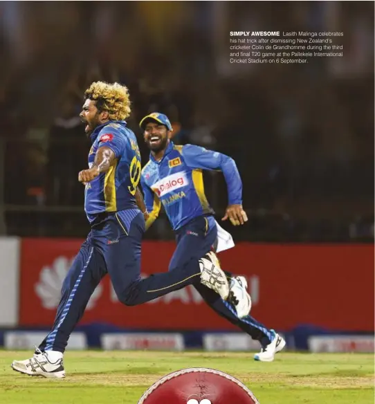  ??  ?? SIMPLY AWESOME Lasith Malinga celebrates his hat trick after dismissing New Zealand’s cricketer Colin de Grandhomme during the third and final T20 game at the Pallekele Internatio­nal Cricket Stadium on 6 September.