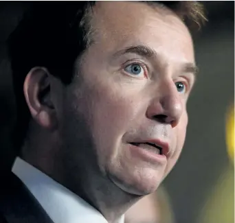  ?? SEAN KILPATRICK/THE CANADIAN PRESS ?? Treasury Board President Scott Brison makes an announceme­nt on Parliament Hill in Ottawa on Monday.