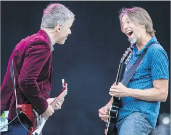  ??  ?? Craig Northey, left, and Murray Atkinson perform with the Odds during Laketown Rock.