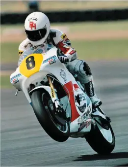  ??  ?? RIGHT: Ron Haslam wrestles his 165bhp factory RGV in the 1989 British GP at Donington Park