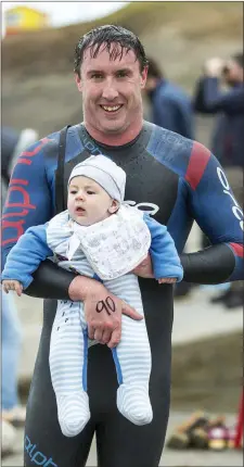  ??  ?? Organiser of the Swim Series, Shane O’Doherty, and baby Oisín.