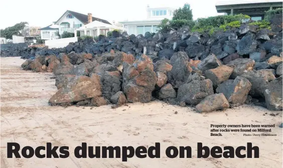  ?? Photo / Perry Hutchinson ?? Property owners have been warned after rocks were found on Milford Beach.