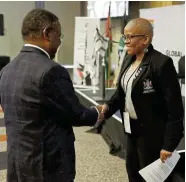  ?? Picture: Global AntiAparth­eid Conference on Palestine ?? Rev Frank Chikane shakes hands with Namibian minister of Justice Yvonne Dausab at the Global AntiAparth­eid Conference on Palestine yesterday.