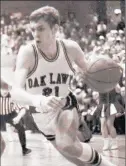  ?? PHOTO PROVIDED BY BOCINSKY ?? Jim Bocinsky, a guard for Oak Lawn’s historic 1971 team, is shown driving to the basket in a supersecti­onal game against St. Patrick during that season.