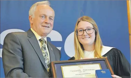  ?? LAWRENCE POWELL ?? Sierra D’ambrose, Behavioura­l Interventi­ons graduate from Bridgetown, earned the Governor General’s Academic Medal for the NSCC Annapolis Valley Campus. She was presented the top award by Kings West MLA and Nova Scotia Health Minister Leo Glavine...