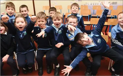  ?? Photo by Michelle Cooper Galvin ?? Some of the pupils’ celebratio­ns at the opening of the 2020 Vision Project Capsule at Knockaderr­y Farranfore NS on Friday.