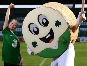  ??  ?? Clara Hogan (11) from Scoil Mhuire, Barntown, with ‘Barry The Bodhrán’, the official tournament mascot she designed for the 2019 UEFA U17 European Championsh­ips, pictured at the launch in Tallaght Stadium, Dublin.