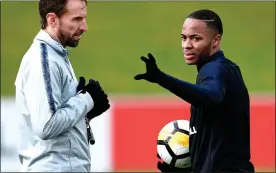  ??  ?? RESPECT: Southgate and Sterling discuss tactics after the spat with Gomez