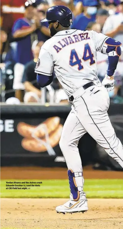  ?? AP ?? Yordan Alvarez and the Astros crush Eduardo Escobar (r.) and the Mets at Citi Field last night.