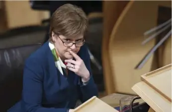  ?? JANE BARLOW/THE ASSOCIATED PRESS ?? Scotland’s First Minister Nicola Sturgeon says her people must decide on their own future.