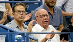  ?? ?? Murdoch and his son and heir Lachlan at the 2018 US Open tennis tournament in New York.