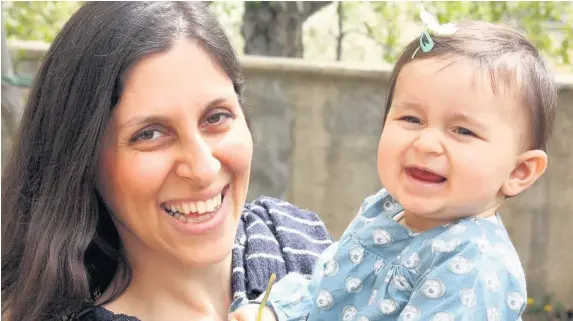  ??  ?? > Nazanin Zaghari-Ratcliffe with her daughter Gabriella before her imprisonme­nt, Gabriella is now three years old