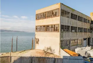  ?? CAYCE CLIFFORD/THE NEW YORK TIMES ?? The former prison known as “The Rock,” on Alcatraz Island, near San Francisco. Scientists and technology experts spent three weeks in December using cameras, drones and a robot dog to gather 4 trillion bytes of data to build the first 3D map of the island in color.