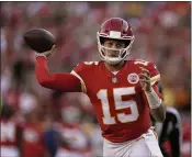  ?? CHARLIE RIEDEL — THE ASSOCIATED PRESS ?? Kansas City Chiefs quarterbac­k Patrick Mahomes throws during the first half against the Green Bay Packers last Sunday in Kansas City, Mo.