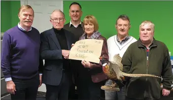  ??  ?? Presentati­on of funds raised in the 2016 Cock Pheasant Competitio­n was presented to Margaret Rochford (on behalf of Irish Heart Foundation). Also present: Jerry Lundy, Robert Lundy, Roger McCarrick, Margaret Rochford, Jimmy Coleman and Chris Wimsey.