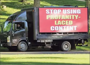  ?? Christian Abraham / Hearst Connecticu­t Media ?? A billboard truck rented by the organizer of Greenwich Patriots drives past a BOE meeting at Central Middle School in Greenwich on Thursday. Members are urging people to attend and speak at public comment to protest masking, vaccinatio­ns for students and critical race theory.