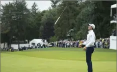  ?? PHOTO/CHRIS SZAGOLA ?? Justin Rose, of England, tosses his club after missing a putt for par on the 18th hole during the BMW Championsh­ip golf tournament at the Aronimink Golf Club, on Monday, in Newtown Square, Pa. AP