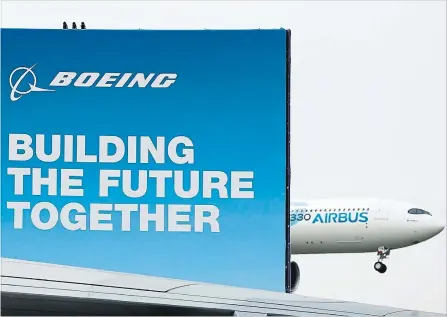  ?? JASPER JUINEN BLOOMBERG ?? Boeing removed much of the suspense from earnings day when it announced last week that it would take a $4.9 billion after-tax charge for the Max and expected the troubled plane to return to service in the fourth quarter.