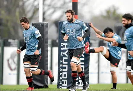  ?? GETTY IMAGES ?? Crusaders, from left, Quinten Strange, Sam Whitelock, Sione Havili and Billy Harmon loosening up at training in Christchur­ch yesterday.
