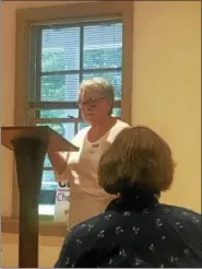  ?? GINGER RAE DUNBAR – DIGITAL FIRST MEDIA ?? Retired school teacher and main speaker, Lee Dastur, speaks at a public meeting for the grassroots organizati­on Gun Sense Chester County about the economic and cultural impact of gun violence.