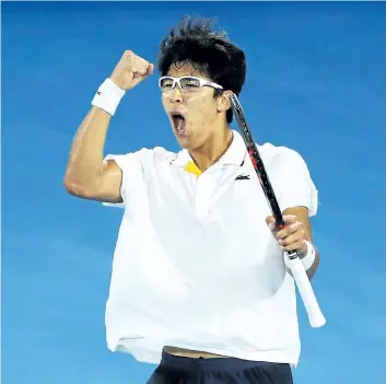  ?? MARK KOLBE/GETTY IMAGES ?? Hyeon Chung celebrates a point in his fourth-round upset victory over Novak Djokovic on Monday at the Australian Open in Melbourne, Australia. Chung, ranked 58th in the world, is the first Korean to reach the quarter-finals at a Grand Slam.