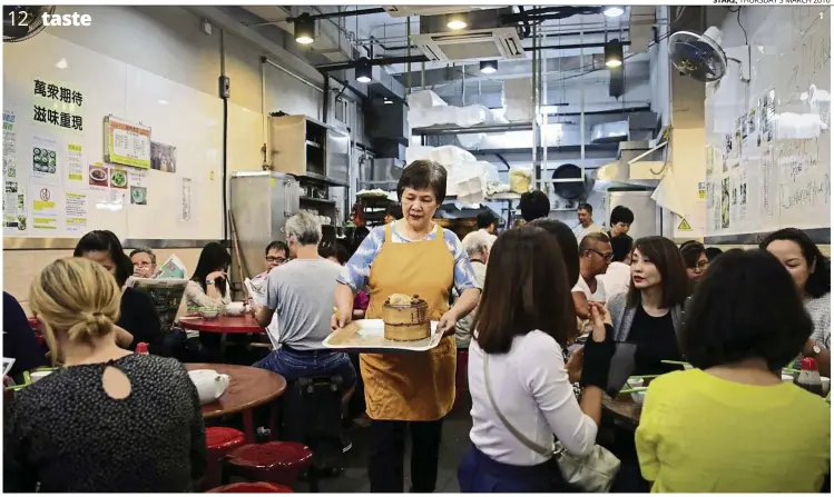  ??  ?? At the Sun Hing restaurant in the Kennedy Town district of Hong Kong, dim sum is still hand- made the traditiona­l way even though more and more restaurant­s on the island are switching to factory- made ones.