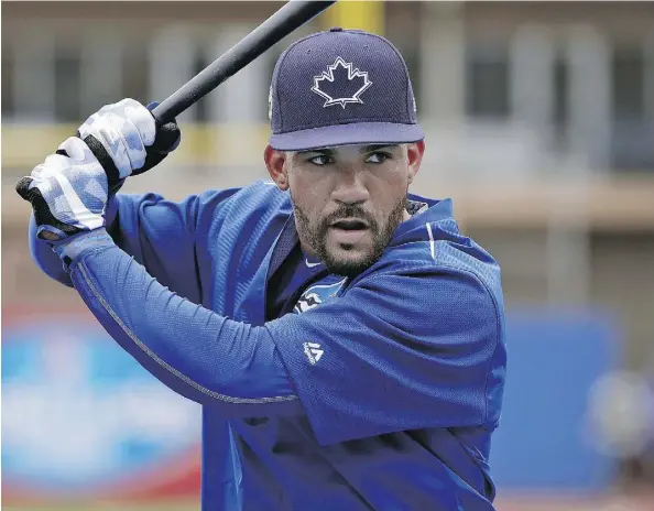  ?? CHRIS O’MEARA/THE ASSOCIATED PRESS ?? Toronto Blue Jays second baseman Devon Travis ran the bases on Friday, a step forward in rehabbing his knee.