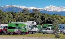 ?? PHOTO: ROSS GIBLIN/FAIRFAX NZ ?? Abandoned rental vehicles parked at a Kaikoura primary school, some of the 340 stranded in the town.