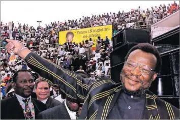  ?? Photo: Odd Andersen/getty Images ?? Party leader: Mangosuthu Buthelezi arrives at the Jabulani stadium in Soweto to address supporters during the Inkatha Freedom Party’s campaign launch in Gauteng ahead of the1999 elections.
