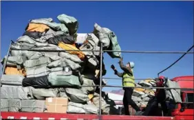  ?? LIU WENHUA / CHINA NEWS SERVICE ?? Items ordered during the Nov 11 shopping festival are loaded in Hohhot, Inner Mongolia autonomous region.