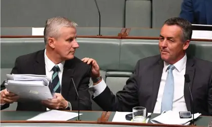  ?? Photograph: Mick Tsikas/AAP ?? Deputy prime minister Michael McCormack and Nationals MP Darren Chester were on the ministeria­l panel overseeing grants for the first three regions.