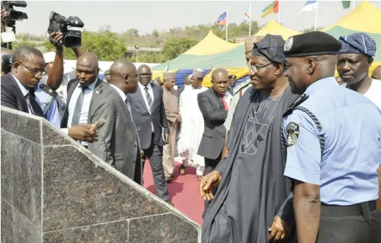  ?? PHOTO Felix Onigbinde ?? President Goodluck Jonathan (second right) with Inspector-General of Police Mohammed Abubakar, during the commission­ing of the Nigeria Police Force Internatio­nal Peacekeepi­ng Centre and the Force Museum in Abuja yesterday.