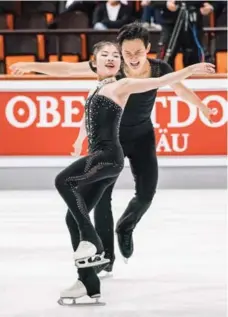  ?? JUN MICHAEL PARK/THE NEW YORK TIMES ?? North Koreans Ryom Tae Ok and Kim Ju Sik qualified for February’s Winter Olympics in Pyeongchan­g with the routine of their lives in Germany.