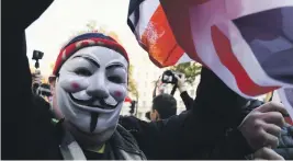  ?? AP ?? A pro-Brexit demonstrat­or outside Downing Street in London