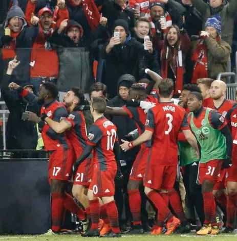  ?? RICK MADONIK/TORONTO STAR ?? Jozy Altidore, left, scored the goal that put Toronto FC in the MLS Cup final for the second straight year. He leads TFC in game-winning goals this year.