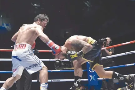  ??  ?? MANNY PACQUIAO was a picture of dominance when he seized the WBA welterweig­ht title from Argentinia­n Lucas Matthysse in “Fight of Champions” held in Kuala Lumpur, Malaysia on Sunday.