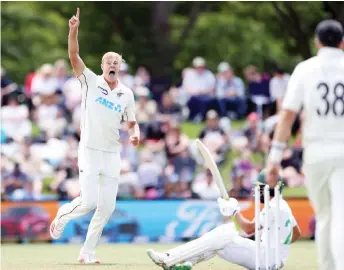  ?? — AFP photo ?? New Zealand’s paceman Kyle Jamieson celebrates the wicket of Pakistan’s Fawad Alam on day one of the second cricket Test match between New Zealand and Pakistan at Hagley Oval in Christchur­ch.