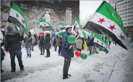 ?? VINCENZO D’ALTO ?? Syrian Montrealer­s were out in force two years ago at Norman Bethune Square marking the fourth anniversar­y of the uprising against Bashar al-Assad’s leadership. Local Syrian-Canadians say they’re not sure what to think after an apparent U.S. policy...