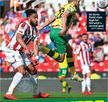  ?? GETTY IMAGES ?? On form: Pukki rises high for Norwich’s second goal